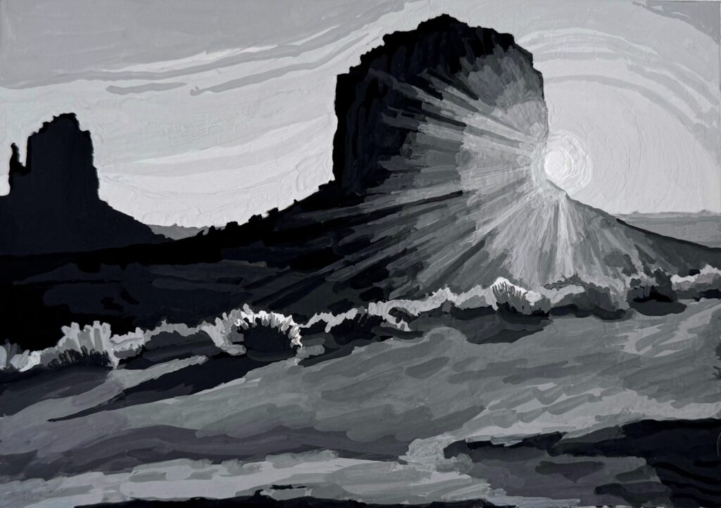 Black and white landscape with a mountain and sun rays.