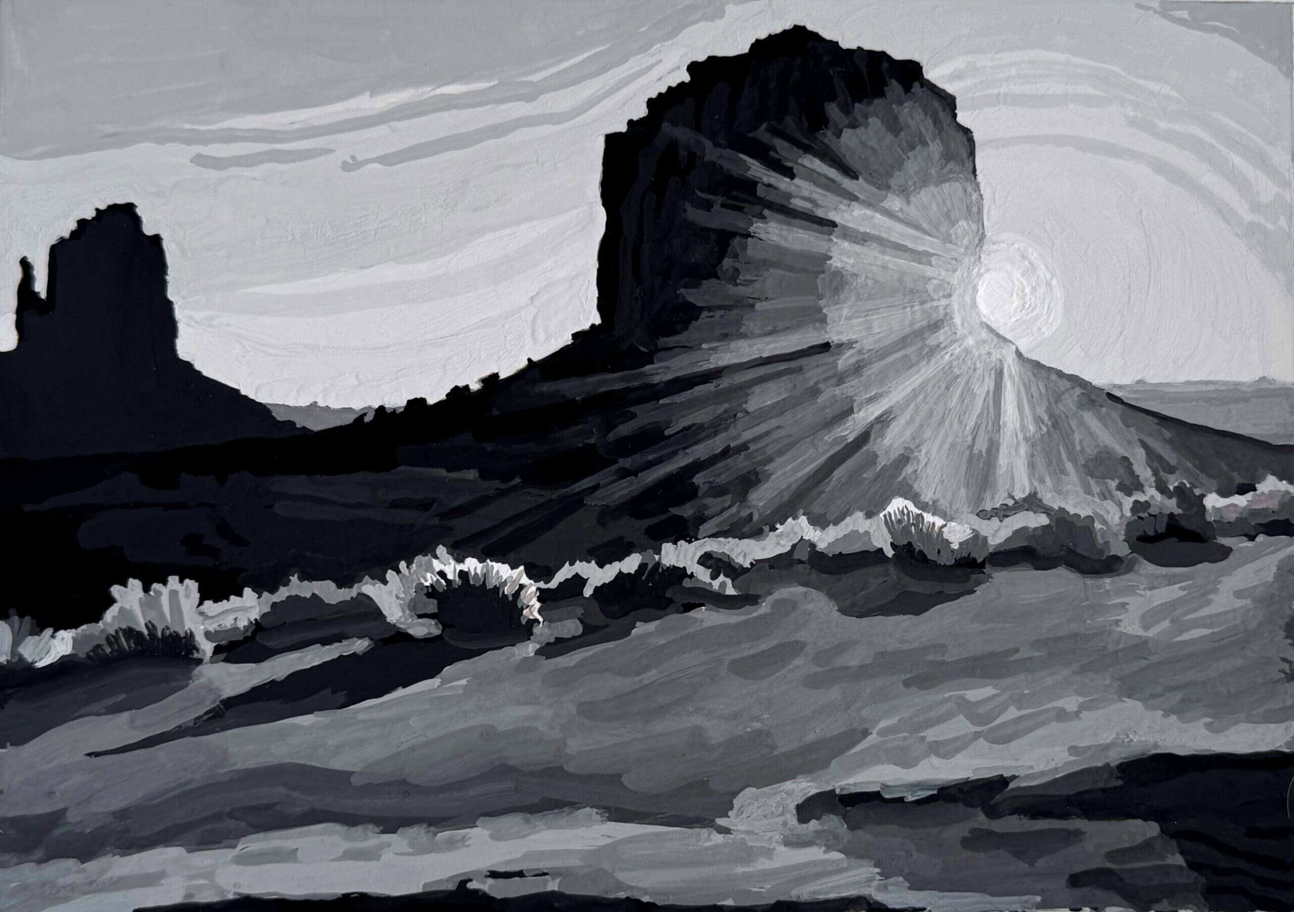 Black and white landscape with a mountain and sun rays.